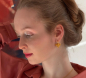 Preview: Portrait of a woman wearing crocus blossom earrings by doll up sister Preview: Portrait of a woman wearing crocus blossom earrings by doll up sister